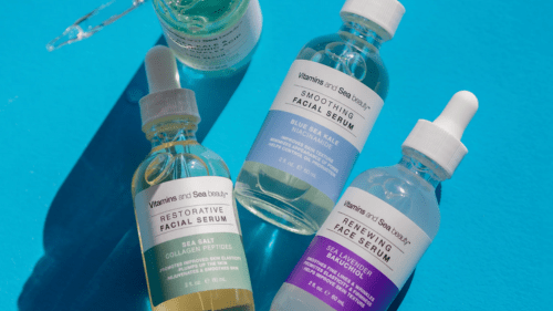 Collection of Vitamins & Sea beauty facial serums featuring restorative and smoothing formulas on a blue background.