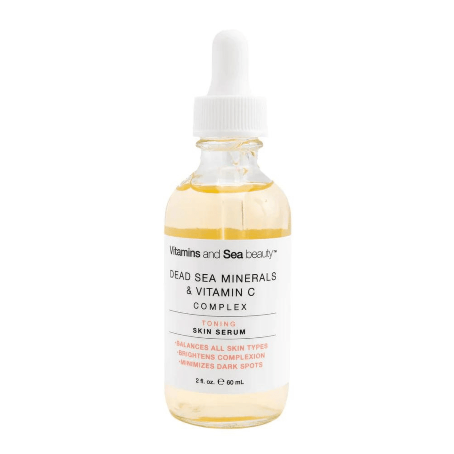 Frasco de suero facial Vitamins and Sea Beauty con minerales del Mar Muerto y vitamina C en envase de vidrio con gotero, diseñado para equilibrar el tono de la piel y reducir manchas oscuras