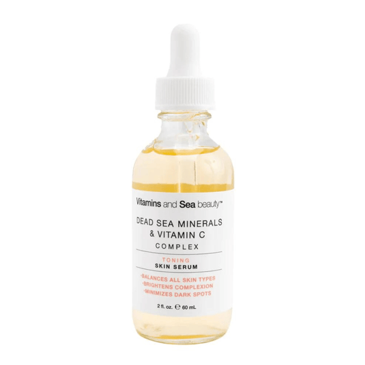 Frasco de suero facial Vitamins and Sea Beauty con minerales del Mar Muerto y vitamina C en envase de vidrio con gotero, diseñado para equilibrar el tono de la piel y reducir manchas oscuras