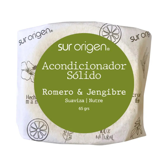 Acondicionador sólido Sur Origen con etiqueta verde que indica ingredientes naturales de Romero y Jengibre. Producto artesanal de 65 gramos, ideal para suavizar y nutrir el cabello. Presentación ecológica y libre de plástico.
