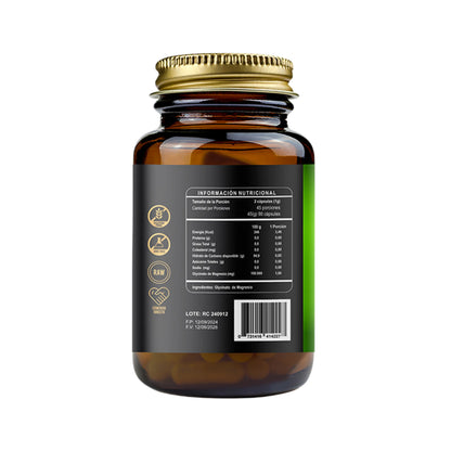 Imagen de la parte posterior del frasco de suplemento “Glycinato de Magnesio” de Ri&Co Green Vitality. Se observan la tabla de información nutricional, sellos de “Sin gluten”, “RAW”, “Producto Natural” y “Conexión Directa”, además de un código de barras. Frasco ámbar con tapa dorada y etiqueta negra con detalles verdes.