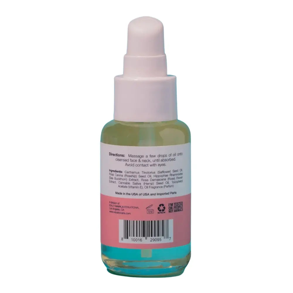 Botella de aceite facial hidratante de espino amarillo y rosa mosqueta con instrucciones e ingredientes en la contraetiqueta.
